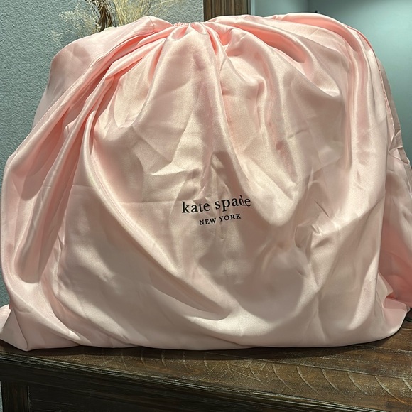 kate spade Handbags - Kate Spade Pink XXL dust bag. Can fit a European pillow or duffel bag. 34” X 28”